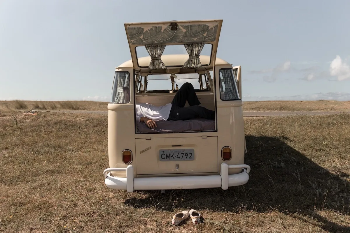 A van alone in the middle of a field